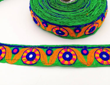 Green Mirrored Fabric Trim With Orange, Yellow, Blue And Pink Embroidery